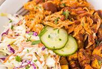 Whole30 BBQ Chicken Power Bowls with Roasted Sweet Potatoes and Tangy Slaw