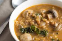 Hearty Curried Lentil Kale Soup with Earthy Mushrooms
