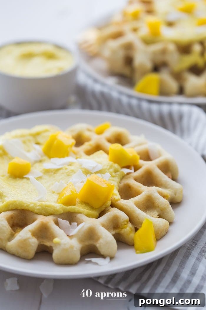 Best Paleo Waffles, tender and light, topped with luscious sweet mango cream for an energizing breakfast.