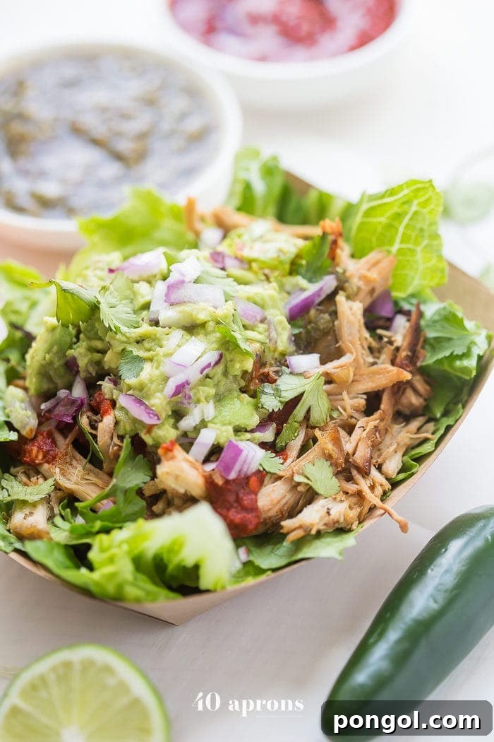 Chipotle Inspired Whole30 Carnitas Power Bowl 2 Experience the joy of a homemade Chipotle copycat Whole30 carnitas bowl, perfect for a healthy and flavorful meal any time of year.