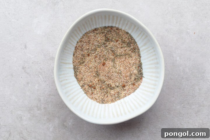 Homemade jerk spice blend in a white bowl.