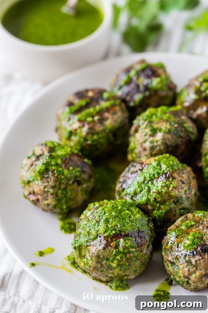 Flavor-packed chimichurri Whole30 meatballs with fresh herbs and Swiss chard, perfect for an easy, healthy weeknight dinner.