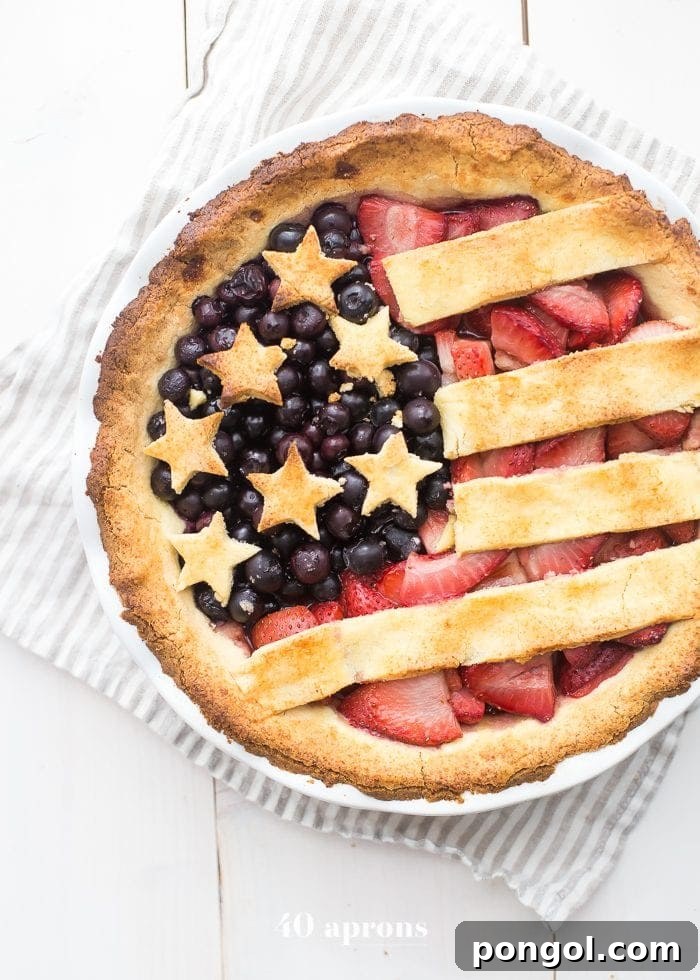 Guilt-Free Paleo American Flag Pie 2 Stunning Paleo American Flag Pie with fresh strawberries and blueberries, perfect for 4th of July