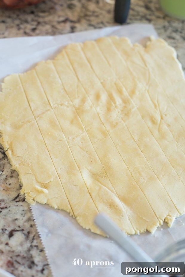 Guilt-Free Paleo American Flag Pie 12 Pie crust strips and stars arranged on a paleo American flag pie