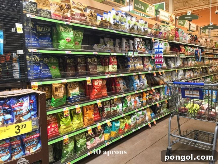 Two bags of Kettle Brand Avocado Oil Potato Chips, Himalayan Salt and Chili Lime flavors, displayed.