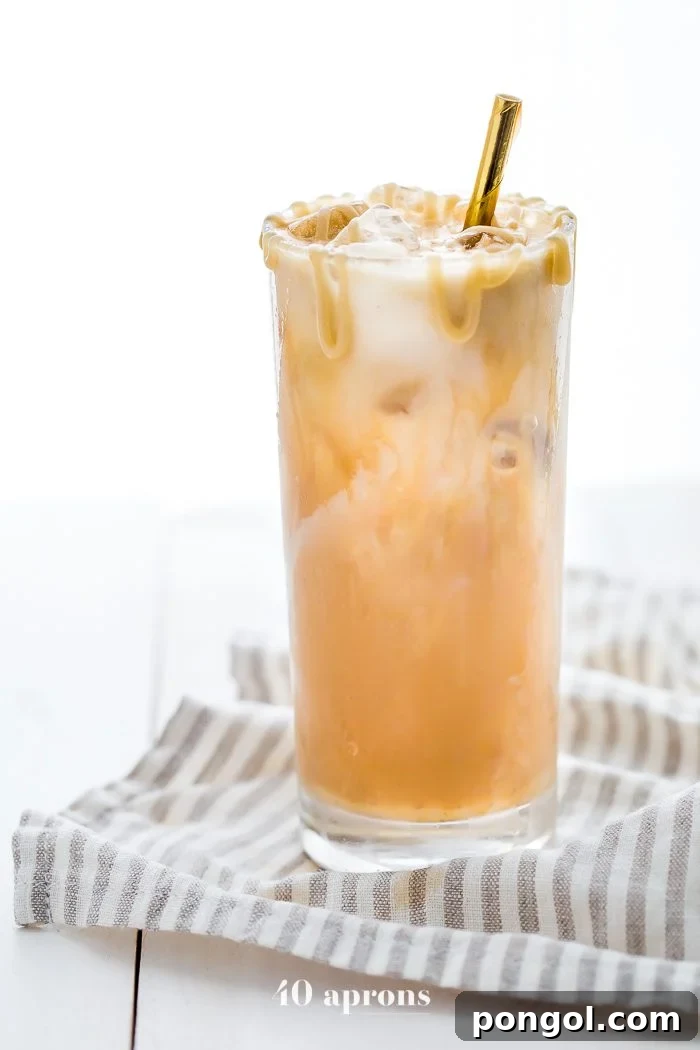 Rich and refreshing paleo iced caramel macchiato with homemade caramel sauce