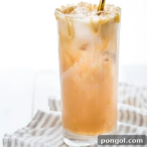 Rich Paleo Iced Caramel Macchiato with almond milk and cold brew
