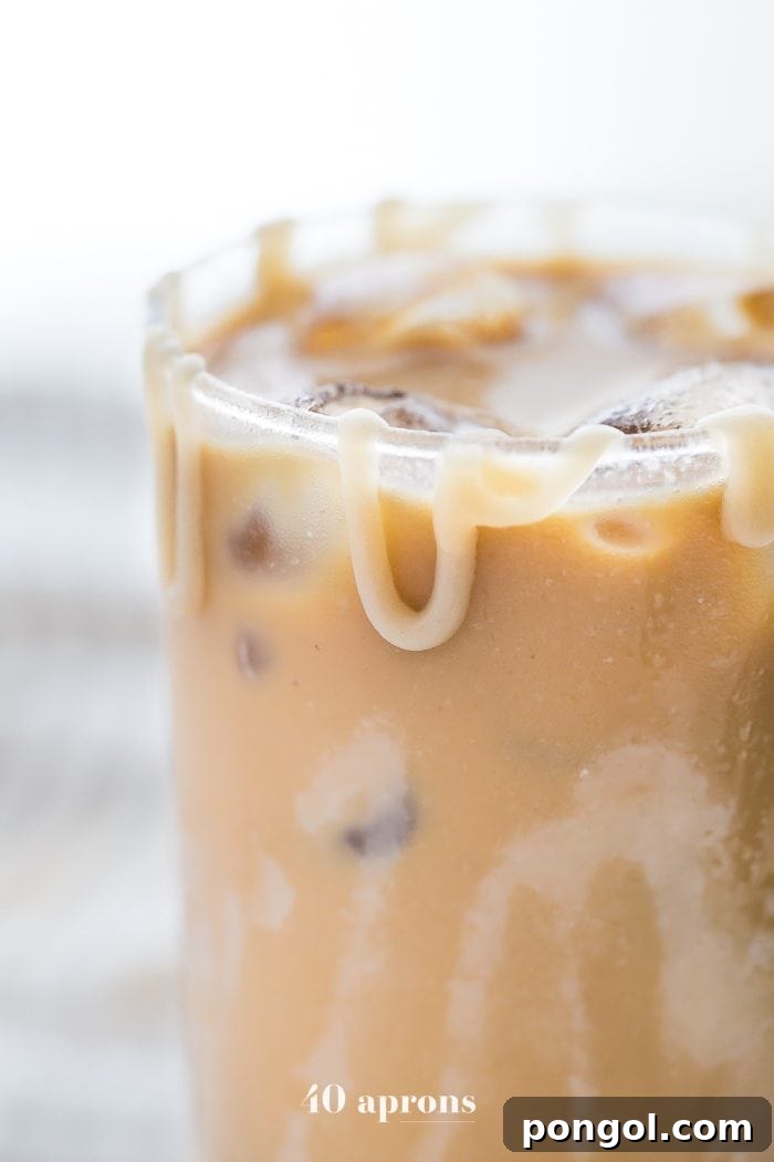 Refreshing homemade paleo macchiato with caramel drizzle