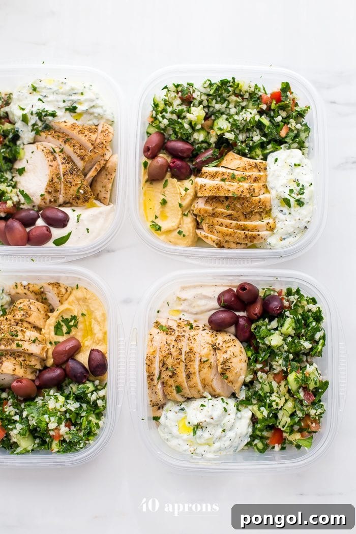 This Greek healthy meal prep recipe is epic: cauliflower rice tabbouleh, tender seasoned chicken breasts, hummus or baba ganoush, kalamata olives, and a rich, garlicky tzatziki. This healthy meal prep recipe will have you looking forward to lunch all morning! It's also a Whole30 meal prep recipe and paleo meal prep recipe, too, when you sub coconut cream or coconut yogurt for the yogurt. This is seriously SUCH a perfect healthy meal prep recipe.