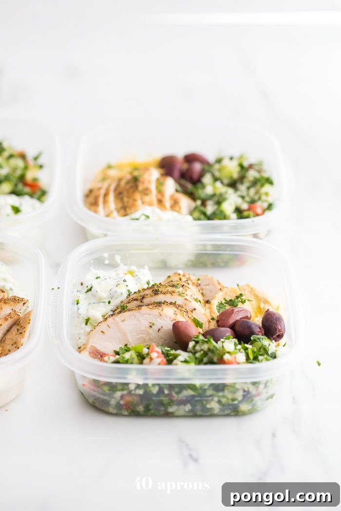 This Greek healthy meal prep recipe is epic: cauliflower rice tabbouleh, tender seasoned chicken breasts, hummus or baba ganoush, kalamata olives, and a rich, garlicky tzatziki. This healthy meal prep recipe will have you looking forward to lunch all morning! It's also a Whole30 meal prep recipe and paleo meal prep recipe, too, when you sub coconut cream or coconut yogurt for the yogurt. This is seriously SUCH a perfect healthy meal prep recipe.