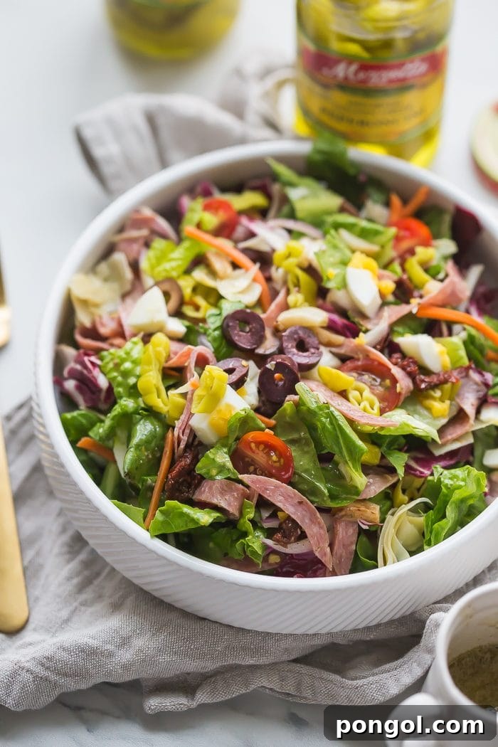 Overhead view of a large bowl of Paleo Italian Salad, showcasing its colorful ingredients.