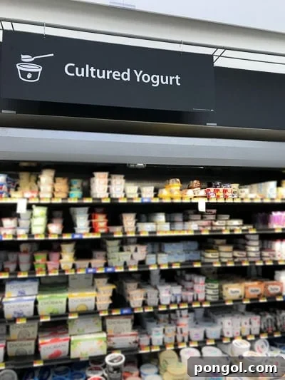 A close-up of Horizon Organic Yogurt, highlighting the quality of ingredients used in these healthy gluten-free muffins.