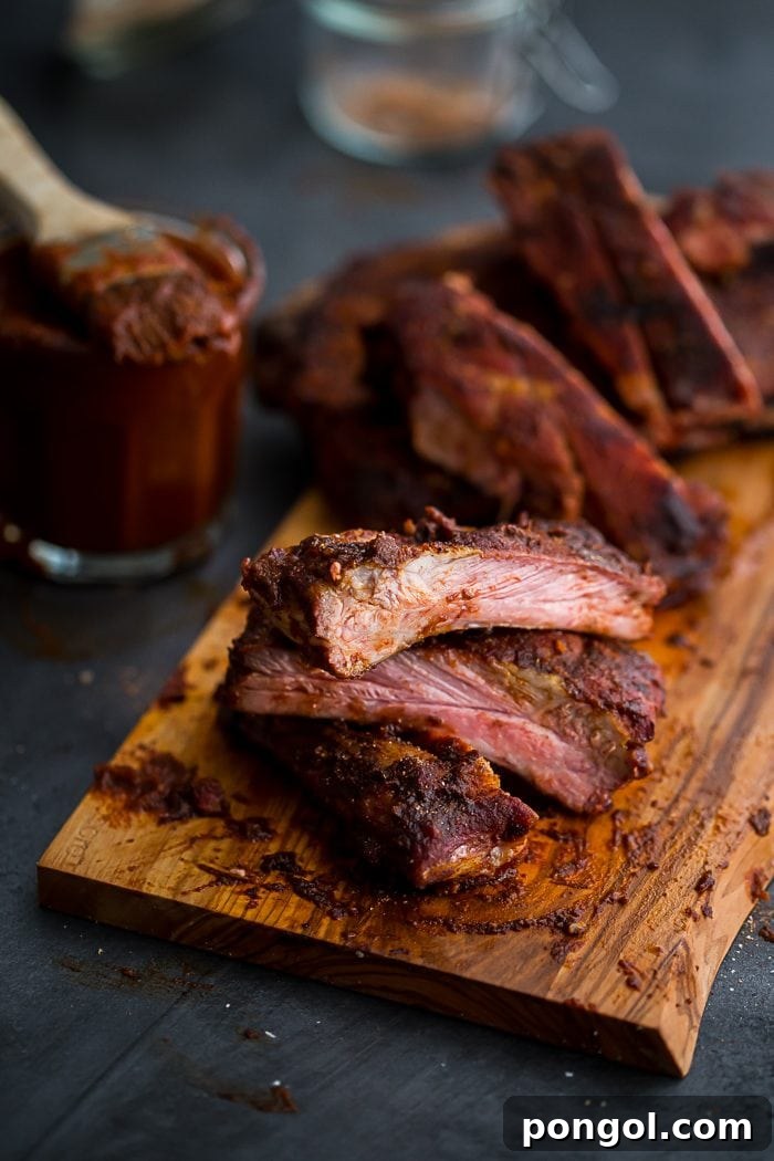 This Whole30 BBQ sauce is a delicious Whole30 condiment. Perfect on ribs, pulled pork, or chicken, this Whole30 BBQ sauce is spiced with chipotle powder and lightly sweetened with coconut aminos. A jar of this Whole30 BBQ sauce in the fridge will mean plenty of simple, flavorful Whole30 dinners!