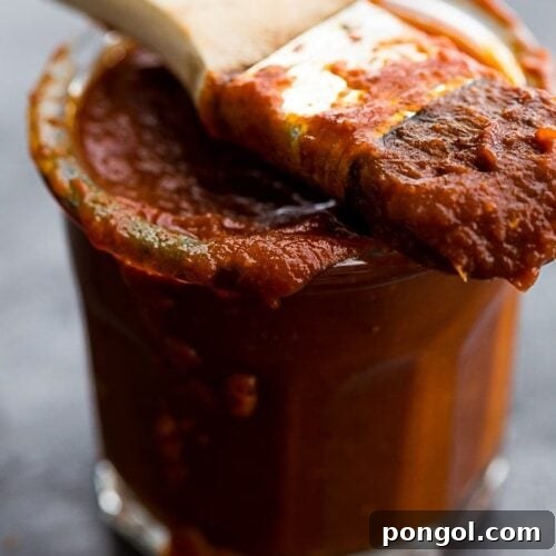 This Whole30 BBQ sauce is a delicious Whole30 condiment. Perfect on ribs, pulled pork, or chicken, this Whole30 BBQ sauce is spiced with chipotle powder and lightly sweetened with coconut aminos. A jar of this Whole30 BBQ sauce in the fridge will mean plenty of simple, flavorful Whole30 dinners!