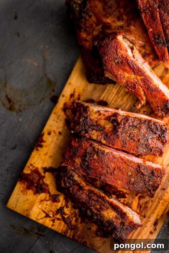 These Whole30 ribs are easy and cooked on the grill, making them a great Whole30 dinner! Smoky, spicy, and full of flavor, they're delicious with my Whole30 BBQ sauce. Definitely the perfect Whole30 ribs or Whole30 dinner now that football season is upon us!