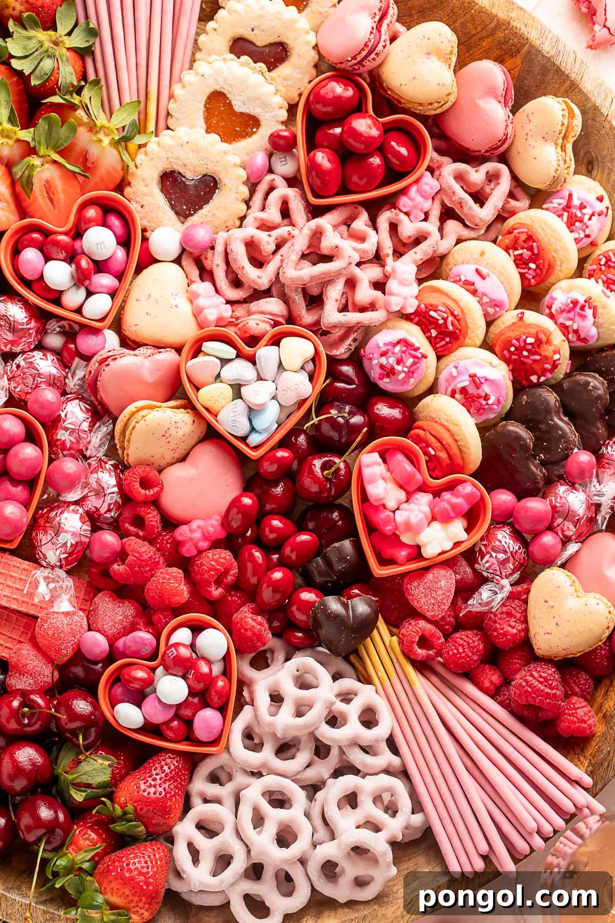 Cupid's Sweetest Board 5 Another perspective of the Valentine's Day themed charcuterie board, rich with varied textures and colors.