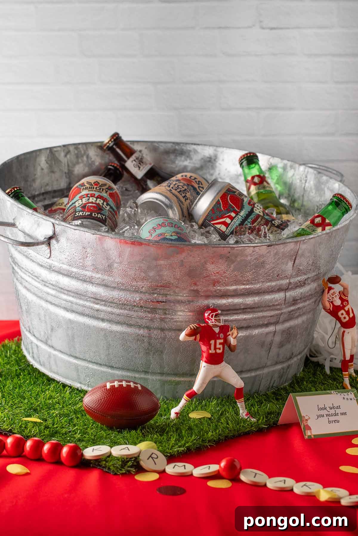 A large galvanized bucket of ice and different bottles and cans of beer, ready for guests.