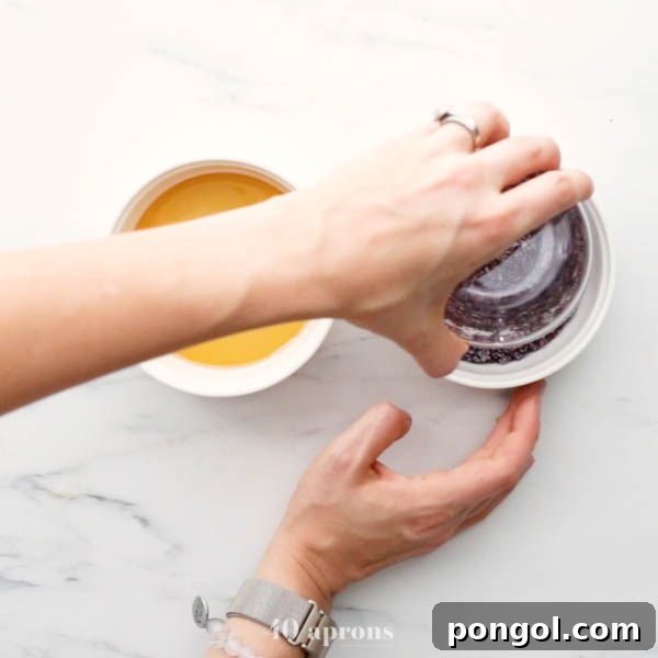 Dip rims in honey and then blueberry mixture