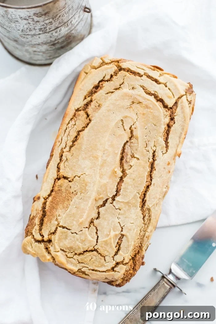 Loaf of paleo pumpkin bread with cream cheese swirl 