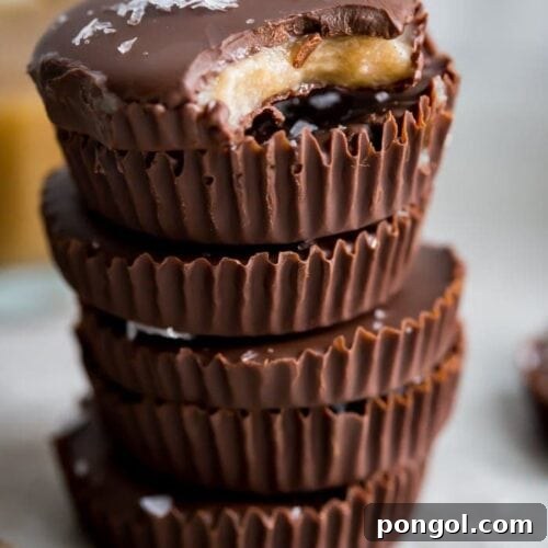 A stunning spread of Paleo Chocolate Cups with Caramel, showcasing their rich texture and delicious filling, garnished with sea salt flakes.