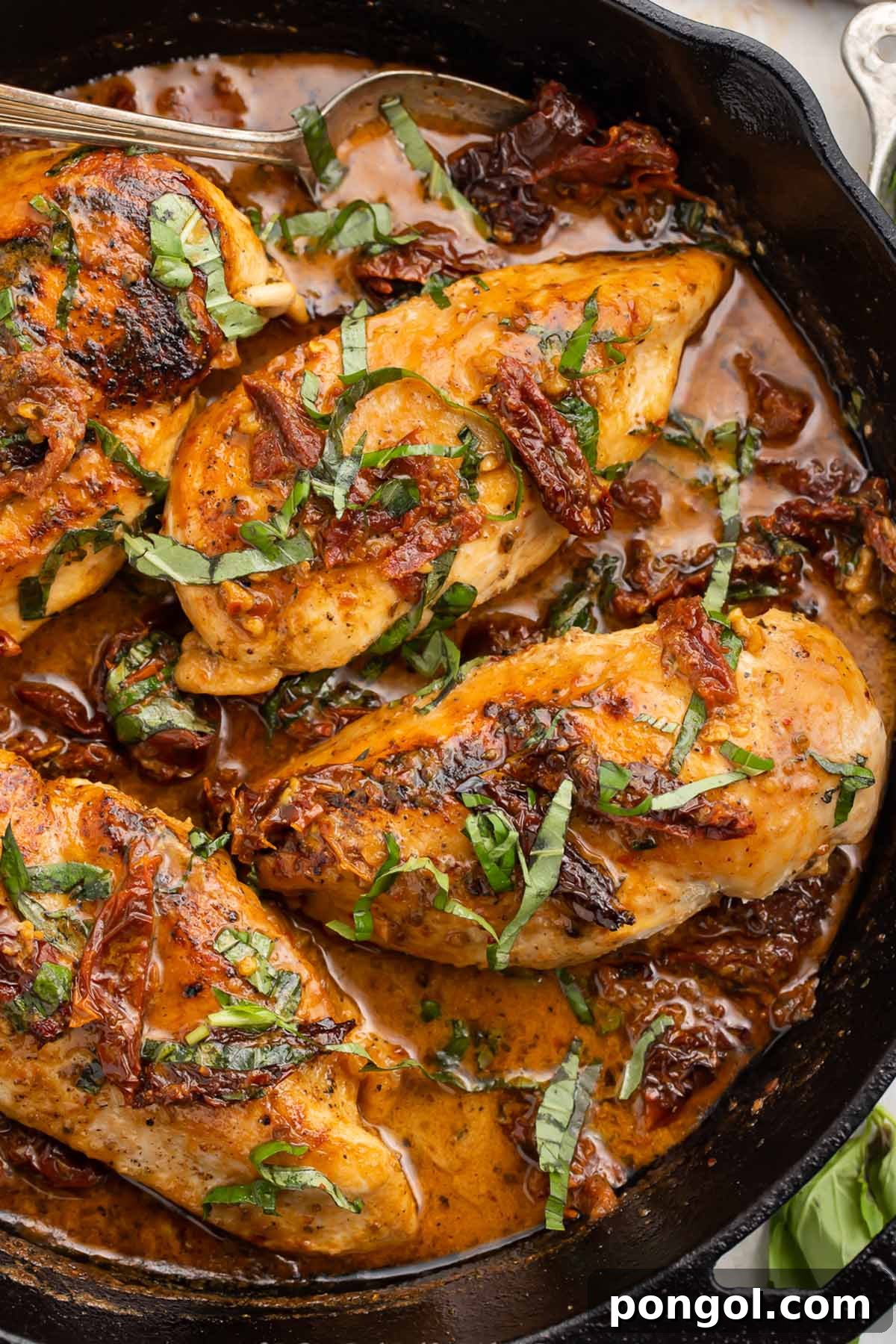 Whole30 marry me chicken in a cast iron skillet.