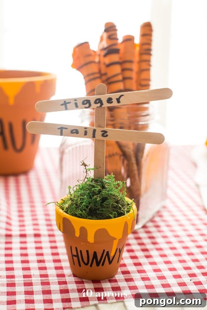This DIY Winnie the Pooh birthday party is too cute! With tons of Winnie the Pooh birthday party ideas, this is your Winnie the Pooh birthday party guide. Happy birthday, little one! It'd make a great Winnie the Pooh baby shower, too.