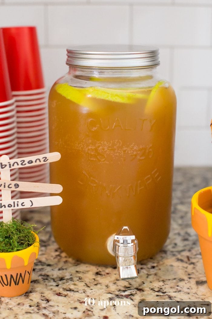 This DIY Winnie the Pooh birthday party is too cute! With tons of Winnie the Pooh birthday party ideas, this is your Winnie the Pooh birthday party guide. Happy birthday, little one! It'd make a great Winnie the Pooh baby shower, too.