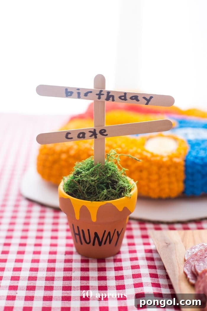 This DIY Winnie the Pooh birthday party is too cute! With tons of Winnie the Pooh birthday party ideas, this is your Winnie the Pooh birthday party guide. Happy birthday, little one! It'd make a great Winnie the Pooh baby shower, too.