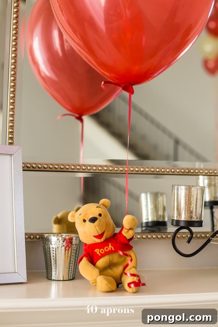 This DIY Winnie the Pooh birthday party is too cute! With tons of Winnie the Pooh birthday party ideas, this is your Winnie the Pooh birthday party guide. Happy birthday, little one! It'd make a great Winnie the Pooh baby shower, too.