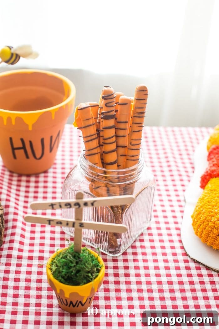 This DIY Winnie the Pooh birthday party is too cute! With tons of Winnie the Pooh birthday party ideas, this is your Winnie the Pooh birthday party guide. Happy birthday, little one! It'd make a great Winnie the Pooh baby shower, too.
