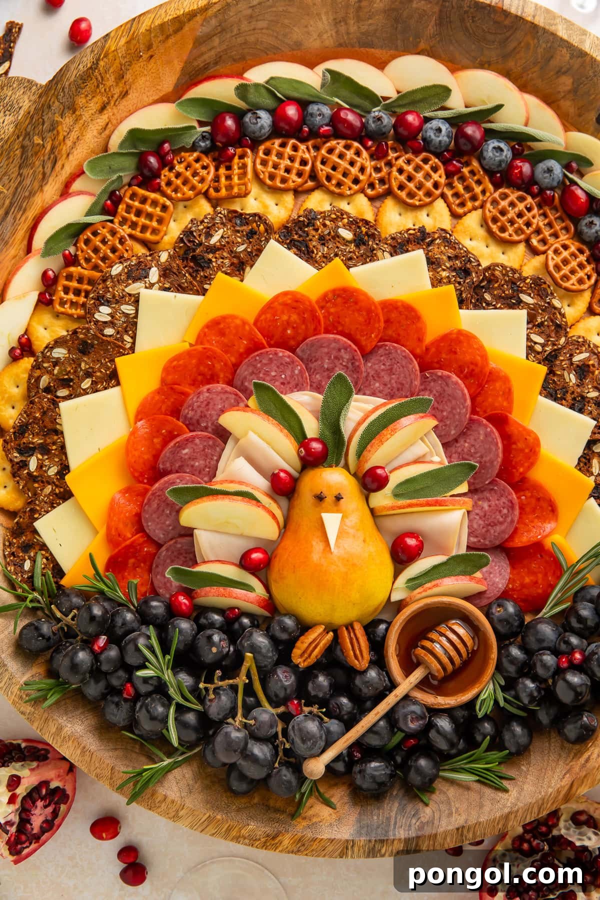Thanksgiving Turkey Charcuterie Board with a pear turkey centerpiece surrounded by layers of premium cheeses, savory meats, seasonal fruits, and crunchy crackers on a large wooden board, perfect for holiday entertaining.