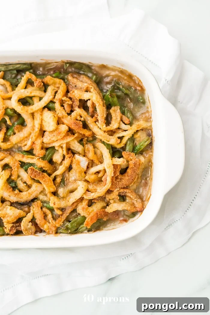 A close-up of the creamy, rich homemade mushroom sauce used in the Whole30 green bean casserole. This dairy-free and grain-free sauce is the heart of the paleo casserole, providing deep umami flavor.