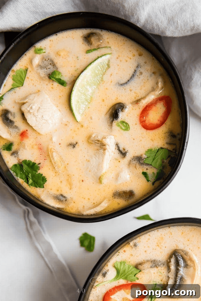 Whole30 Tom Kha Soup with chicken, mushrooms, and coconut broth