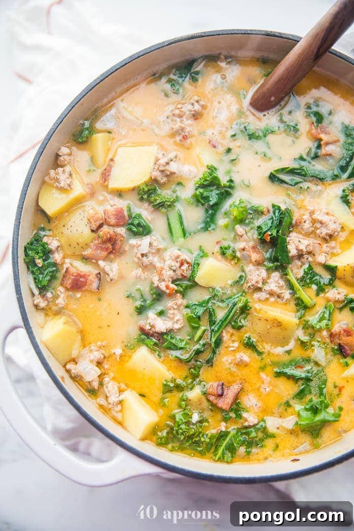Whole30 Zuppa Toscana with crispy bacon, sausage, potatoes, and kale