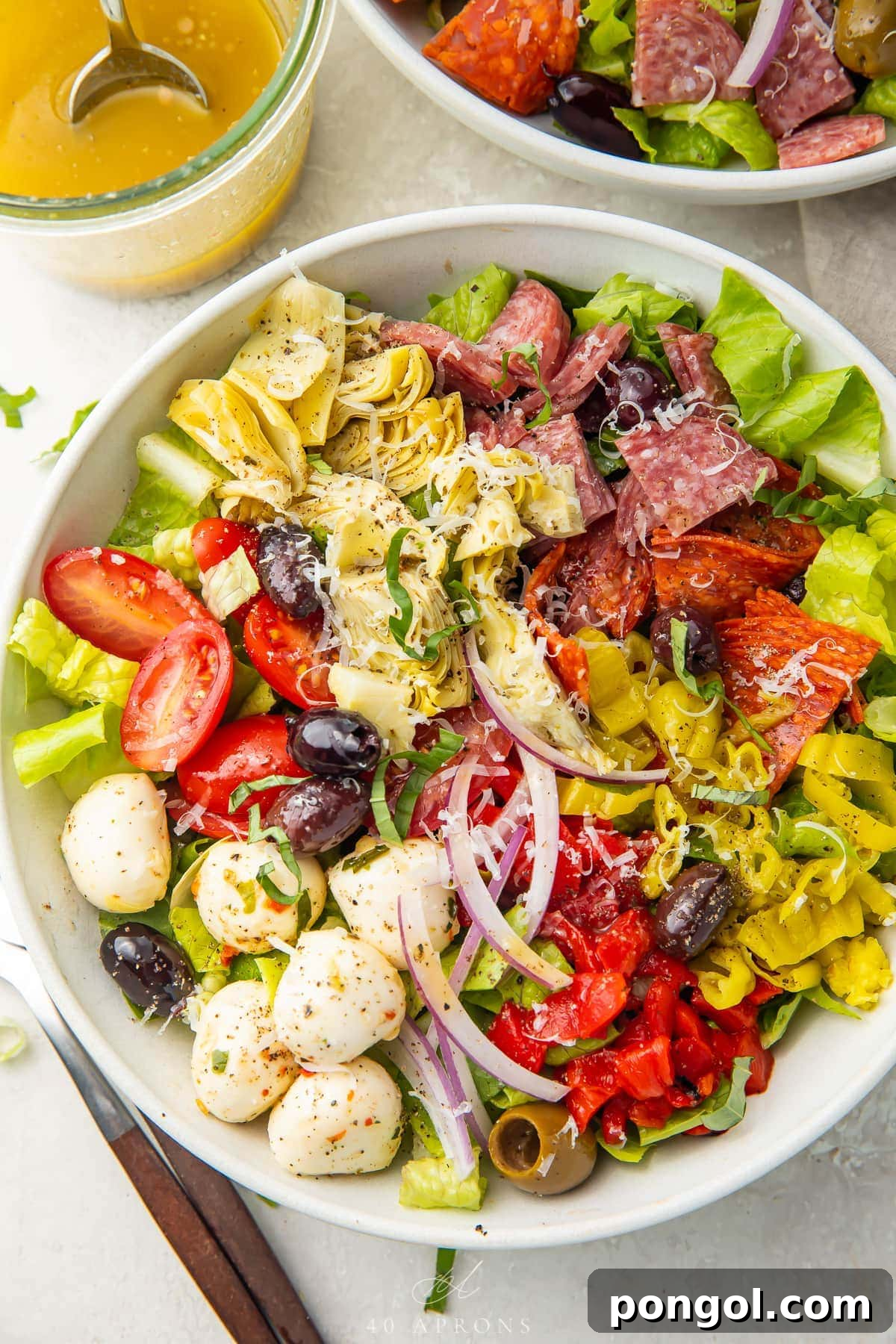Antipasto Salad with salami, pepperoni, mozzarella, and Italian vinaigrette