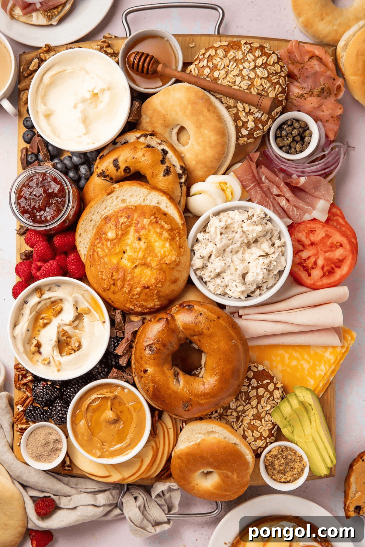 Fully Loaded Bagel Bar with various bagels, toppings, and spreads
