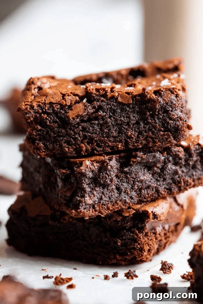 Perfect Paleo Brownies with fudgy centers and crackly tops