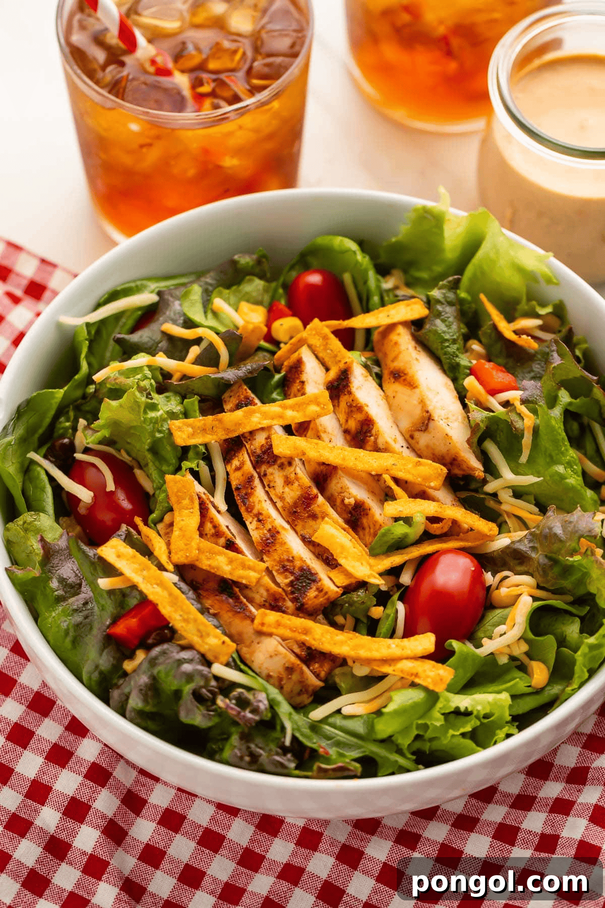 Chick-fil-A Southwest Salad copycat with grilled chicken, black beans, corn, and cilantro-lime dressing