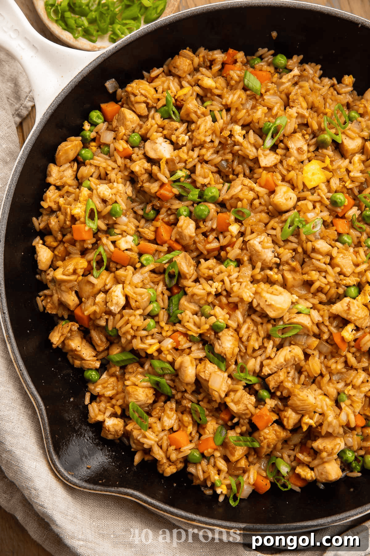 Restaurant-style chicken fried rice with scrambled eggs and vegetables