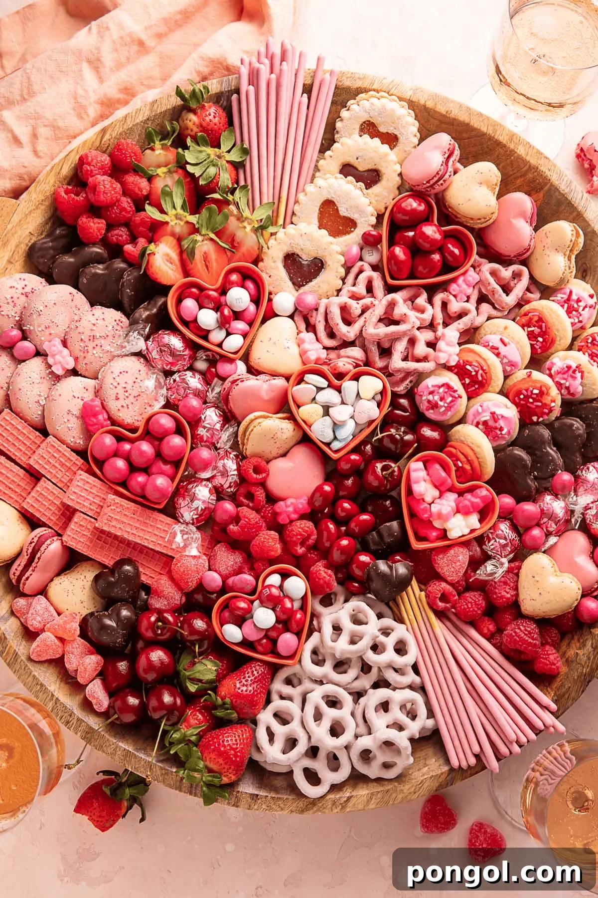 Festive Valentine's Dessert Board artfully arranged with various sweet treats, chocolates, and fruits, perfect for sharing