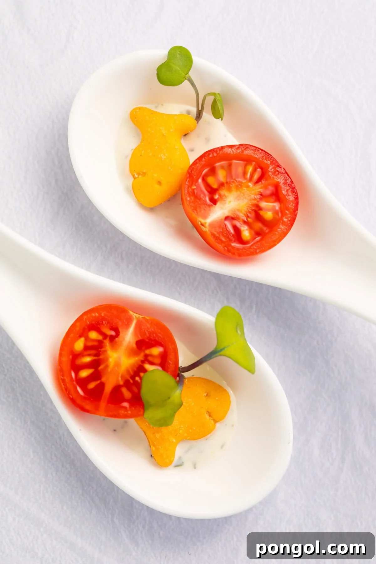 Elegant table setting for a kids' Valentine's dinner with sparkling juice and special plating