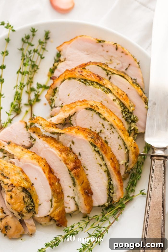 Delicious Whole30 turkey breast with fresh thyme garnish