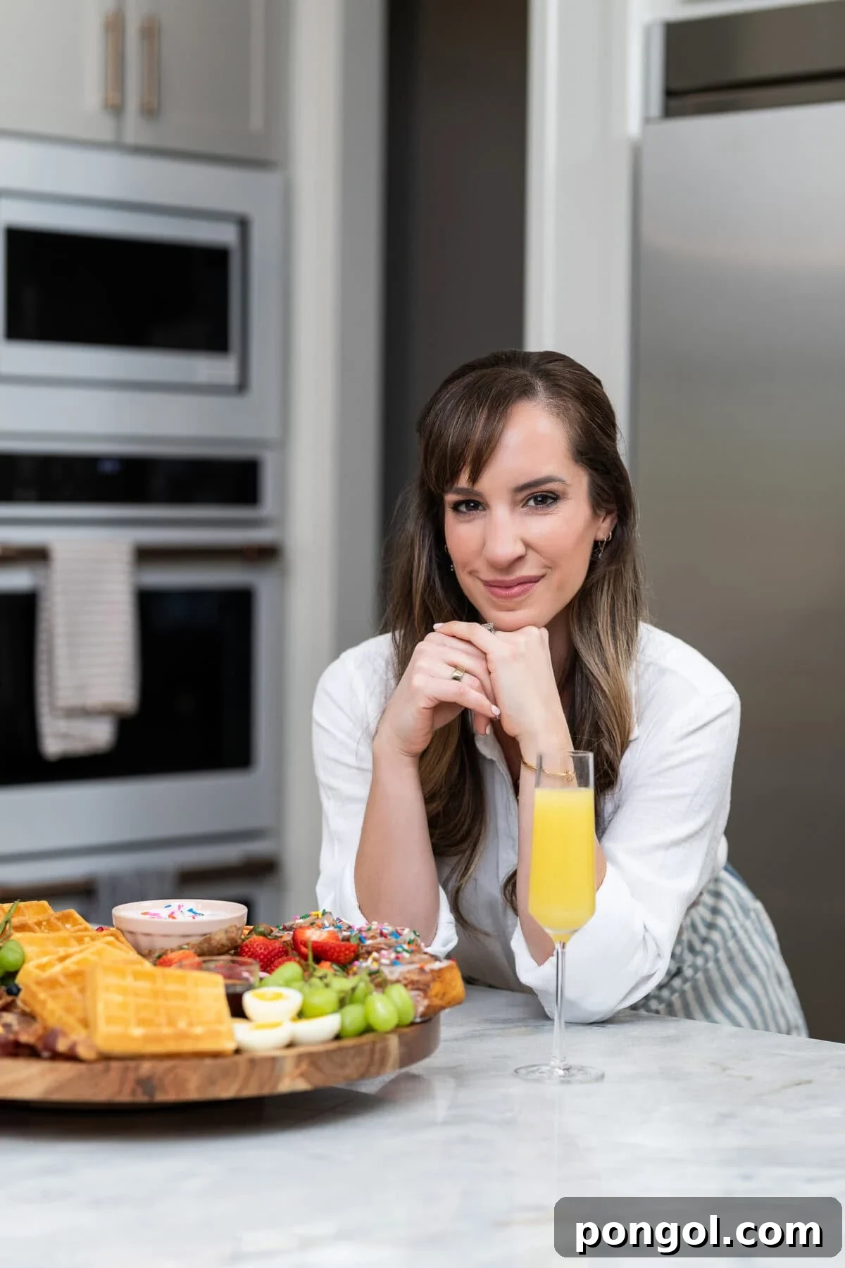 Easter Feasts Gifts and Fun Your Complete Celebration Guide 2 A beautifully set Easter brunch table with fresh flowers, pastries, and drinks, inviting a stress-free celebration.