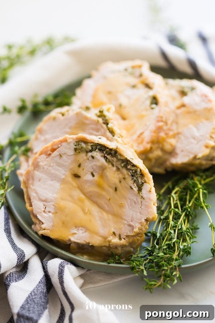 Perfectly cooked Whole30 Instant Pot turkey breast with rich, savory gravy, ready for Thanksgiving.