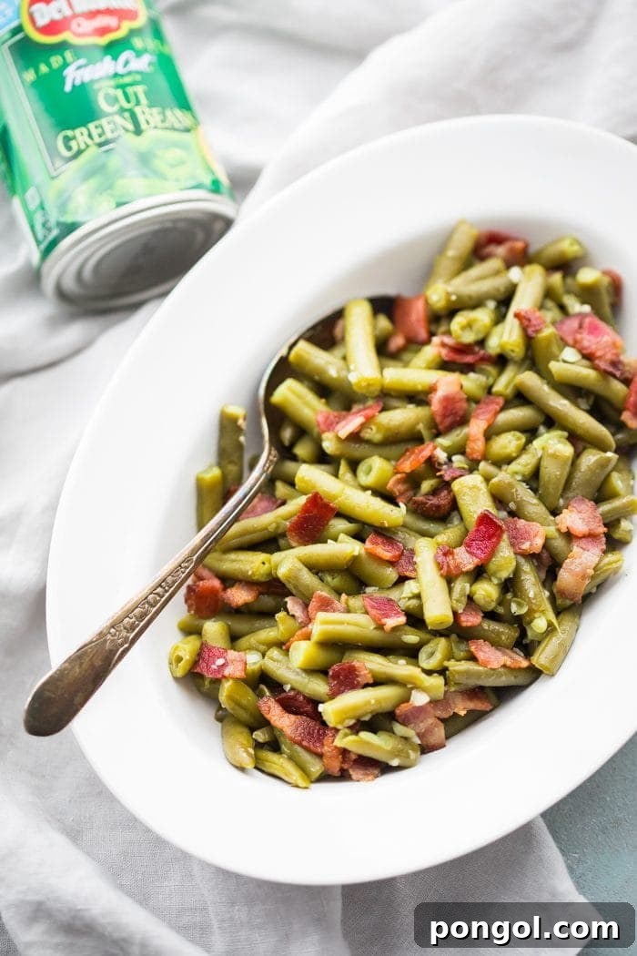 Whole30 Del Monte green beans with bacon in a white dish