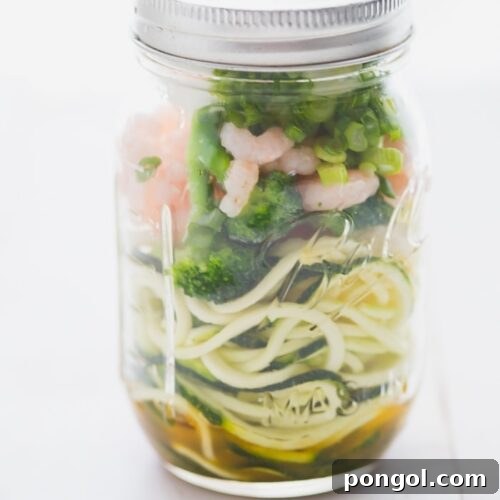 Whole30 Paleo Zoodle Cups 9 Whole30 cup zoodles: zucchini noodles with vegetables and shrimp in a mason jar, ready to eat.