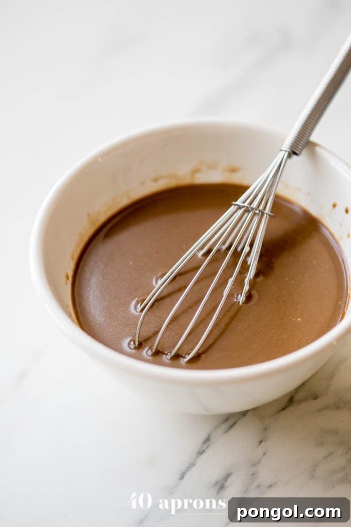 Whole30 Compliant Creamy Balsamic Dressing Paleo Vegan 4 Close-up of creamy Whole30 balsamic dressing being whisked, highlighting its creamy consistency