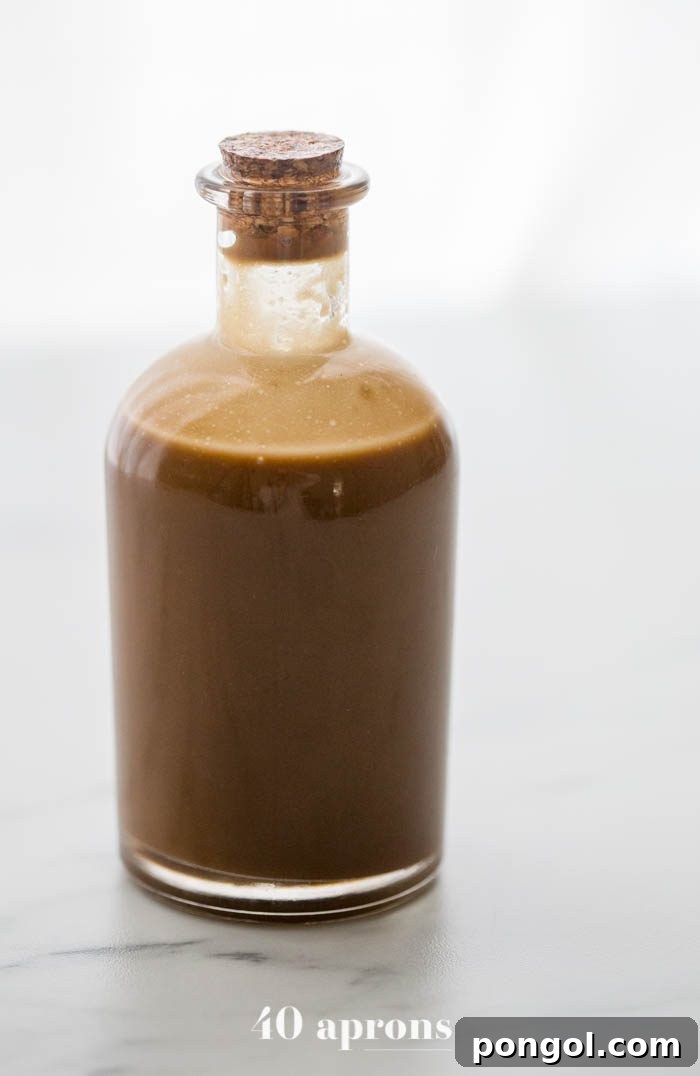 Whole30 Compliant Creamy Balsamic Dressing Paleo Vegan 5 Creamy Whole30 balsamic dressing in a glass jar, perfectly blended and ready for use