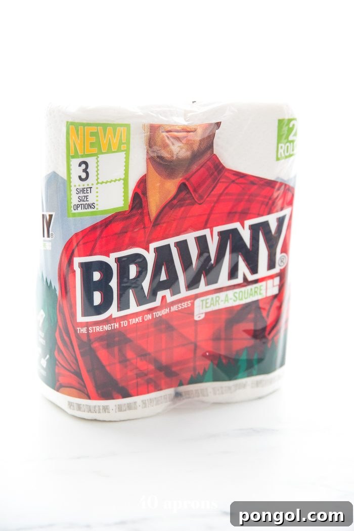 A roll of Brawny Tear-A-Square paper towels, showcasing its innovative design with different tear-off sizes for versatile use.