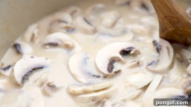 Simmer chicken, mushrooms, and coconut milk